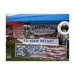 Vinyl banner and stand  by Custom Graphics and Signs