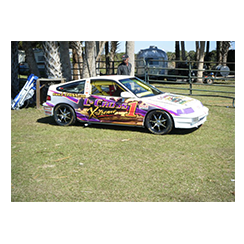 Full car wrap designed by Custom Graphics and Signs