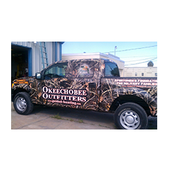 Full truck wrap designed by Custom Graphics and Signs