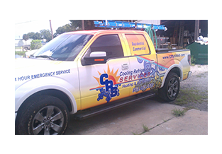 Full pickup truck wrap  designed by Custom Graphics and Signs