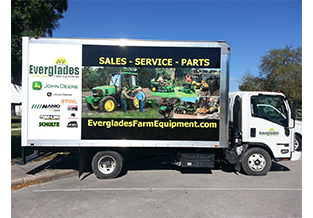 Full box truck wrap designed by Custom Graphics and Signs