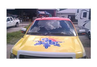 Hood view of full pickup truck wrap  designed by Custom Graphics and Signs