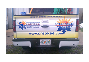 Tailgateview of full pickup truck wrap  designed by Custom Graphics and Signs