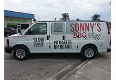 Full van wrap designed by Custom Graphics and Signs