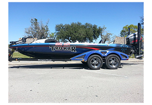 Boat wrap designed by Custom Graphics and Signs