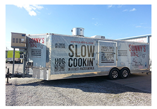 Full trailer wrap designed by Custom Graphics and Signs