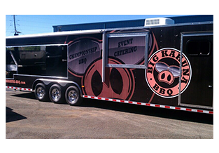 Full trailer wrap designed by Custom Graphics and Signs